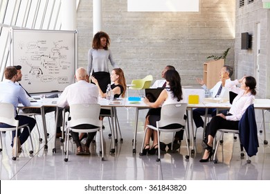 African American Businesswoman Leads Boardroom Meeting