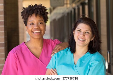 African American and Caucasian Nurse