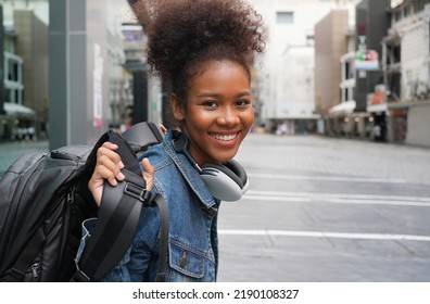 african american college student in city, scholarships to study abroad, Happy woman smile portrait, young college girl. Scholarship, exchange student urban concept. work and travel after graduation. - Shutterstock ID 2190108327