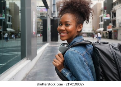 African American College Student In City, Scholarships To Study Abroad, Happy Woman Smile Portrait, Young College Girl. Scholarship, Exchange Student Urban Concept. Work And Travel After Graduation.