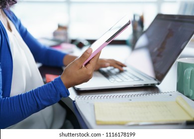 African American College Student Doing Homework At Home. Young Black Woman Preparing School Test With Laptop Computer And Digital Tablet