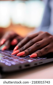 African American Company Remote Worker Typing Message On Laptop Keyboard, Close View On Manicured Nails. Young Corporate Employee, Writing Email On Computer, Focus On Hands