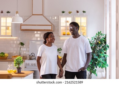 African American Couple In Love In White T-shirts Stand In The Kitchen. Mock-up.