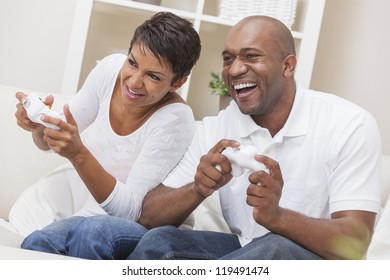 African American Couple, Man And Woman, Having Fun Playing Video Console Games Together