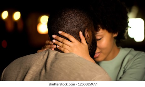African american couple nuzzling, intimate date, sexual desire, seducing girl