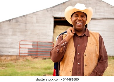 African American Cowboy With An American Flag.