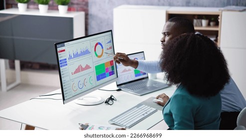African American Data Analyst Using Data Analytics KPI Dashboard