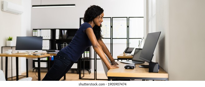 African American Doing Office Exercise Workout Training