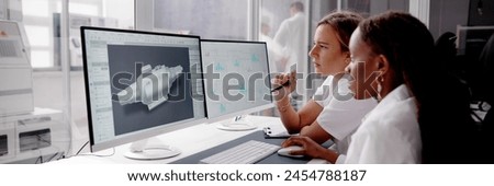 African American engineer using 3D computer to develop engineering skills