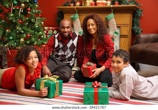 African American Family By Christmas Tree Stock Photo (Edit Now) 38421787