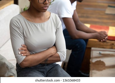 African American Family Couple Sit Apart Turn Back After Fight, Annoyed Upset Jealous Husband And Wife Ignore Talk Feel Stubborn, Misunderstanding In Bad Marriage Relationship Concept, Close Up View