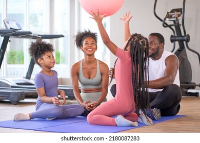 African American Family Happy To Play Gym Ball In Sport Club For Exercise Health And Wellbeing Concept