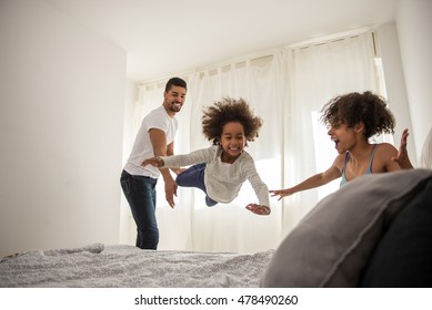 African American Family Having Fun Together At Home.