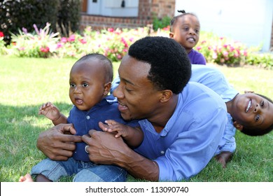 African American Family Together Outside Their Home