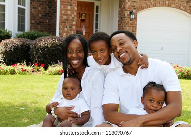 African American Family Together Outside Their Home