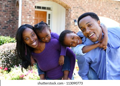 African American Family Together Outside Their Home