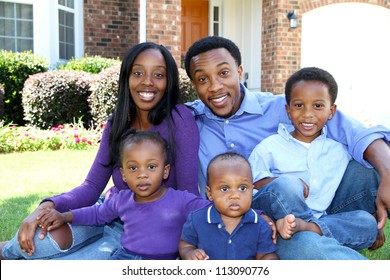 African American Family Together Outside Their Home