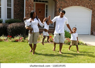 African American Family Together Outside Their Home