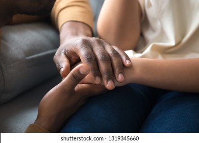 African American Father Dad Holding Hands Of Child As Charity And Support Concept, Children Protection, Kid Adoption Donation, Black Family Love Care Connection, Parenthood, Upbringing, Close Up View