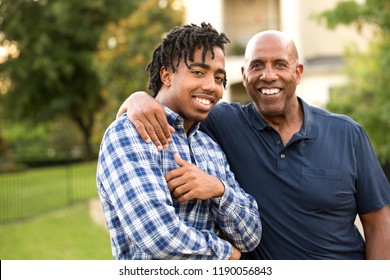 African American Father And His Adult Son.