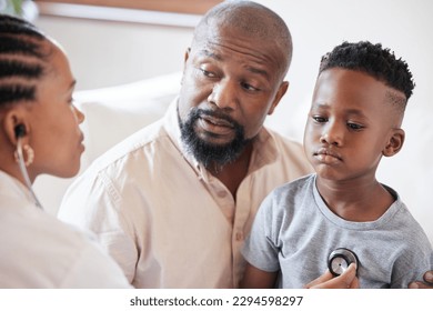 African american female paediatrician examining sick boy with stethoscope during visit with dad. Doctor checking heart and lungs during checkup in hospital. Sick or sad boy receiving medical care - Powered by Shutterstock