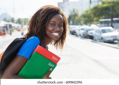 African American Female Student In The City