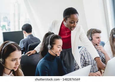 African American Female Supervisor Training Work To Internatinal Team In Call Center Headquarter Office