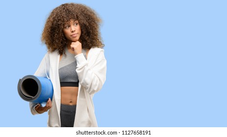 African American Fitness Woman Training Serious Face Thinking About Question, Very Confused Idea