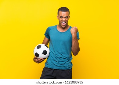 African American Football Player Man Celebrating A Victory