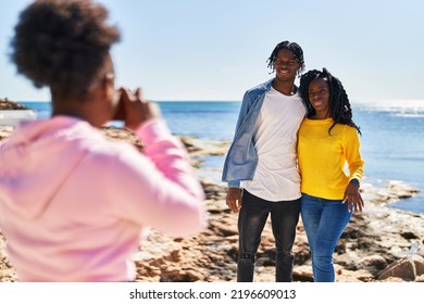 African American Friends Hugging Each Other Making Photo At Seaside