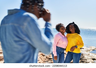 African American Friends Hugging Each Other Making Photo At Seaside