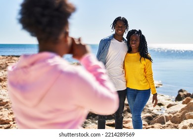 African American Friends Hugging Each Other Making Photo At Seaside