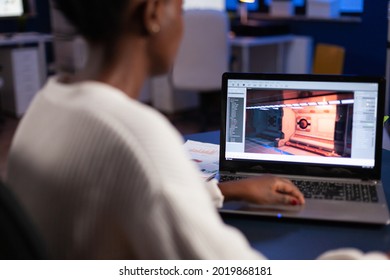 African American Game Developer Testing New Game Working Late At Night In Creativity Agency Company. Tired Creator Designer Developing Online Video Games On Pc Using Modern Production Technology