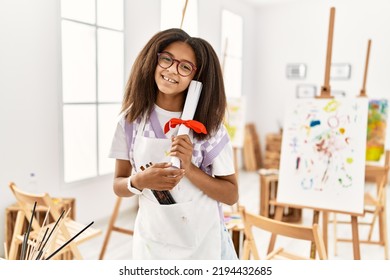 African American Girl Holding Diploma Drawing At Art School