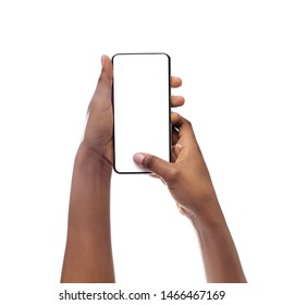 African American Girl Using Phone With Blank Screen, Closeup. Isolated On White Studio Background. Copy Space