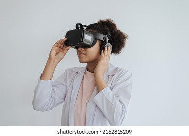 African American Girl With VR Glass Playing Docter. African Girl Have Fun With Virtual Reality Glass.