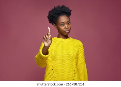 African American Girl Warning Raised Forefinger Up, Does Admonishing Gesture, Giving Advice To Avoid Danger, Disapprove