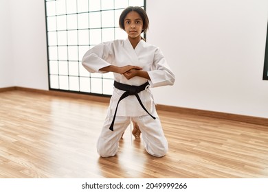 African American Girl Wearing Kimono Training Karate At Sport Center