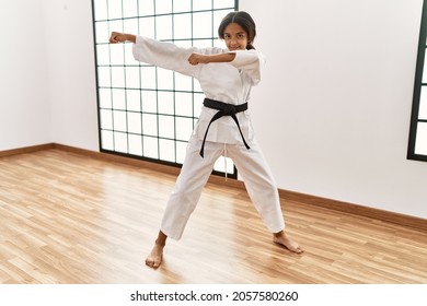 African American Girl Wearing Kimono Training Karate At Sport Center