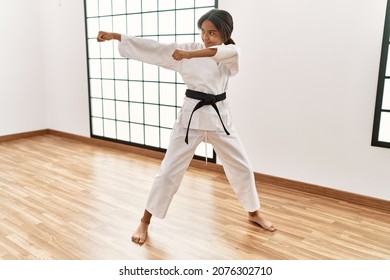 African American Girl Wearing Kimono Training Karate At Sport Center