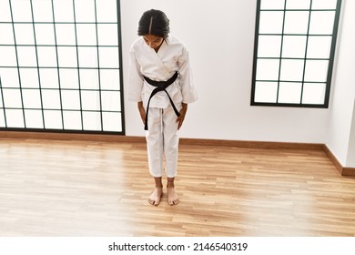 African American Girl Wearing Kimono Training Karate At Sport Center