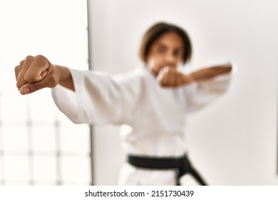 African American Girl Wearing Kimono Training Karate At Sport Center