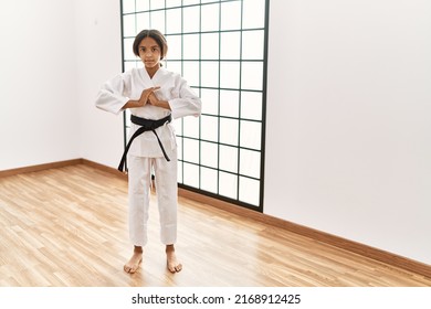 African American Girl Wearing Kimono Training Karate At Sport Center