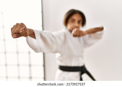 African American Girl Wearing Kimono Training Karate At Sport Center