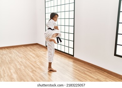 African American Girl Wearing Kimono Training Karate At Sport Center