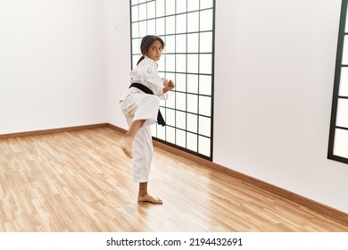 African American Girl Wearing Kimono Training Karate At Sport Center