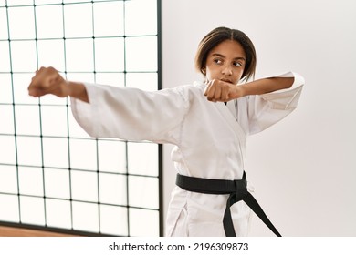 African American Girl Wearing Kimono Training Karate At Sport Center