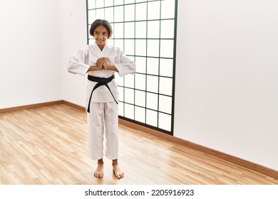 African American Girl Wearing Kimono Training Karate At Sport Center