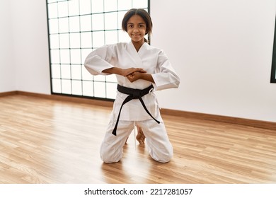 African American Girl Wearing Kimono Training Karate At Sport Center