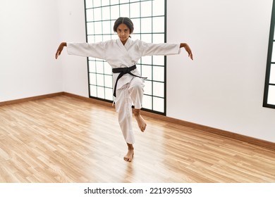 African American Girl Wearing Kimono Training Karate At Sport Center